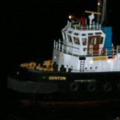 The tug Denton at night